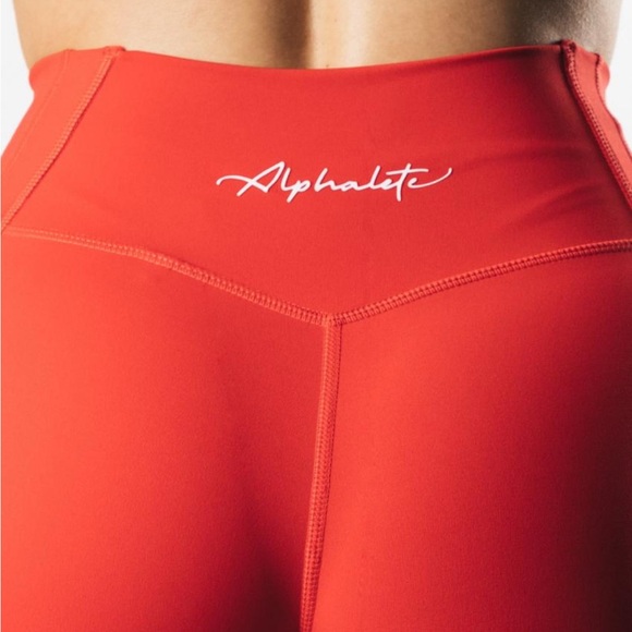 Alphalete Pulse Kinetic Leggings in Bright Coral Pink - Picture 2 of 6